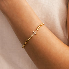 Gold Beaded Cross Stretch Bracelet
