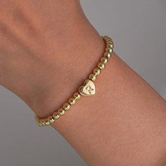 Gold Beaded Bracelet with Heart Initial